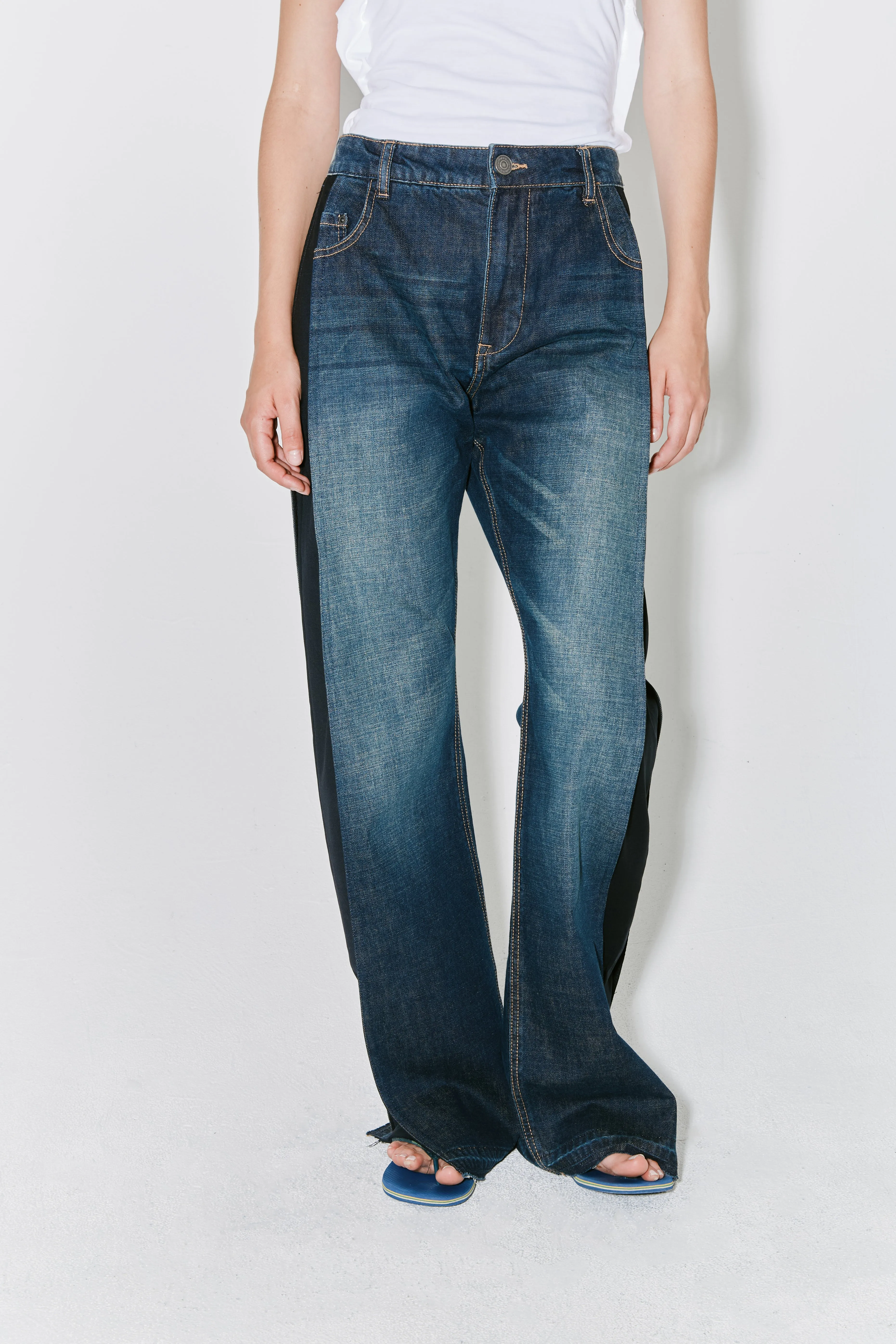 PELLA pants blue and black on side